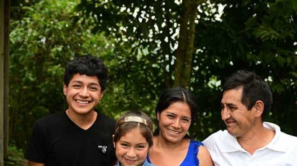 Andean family on their farm